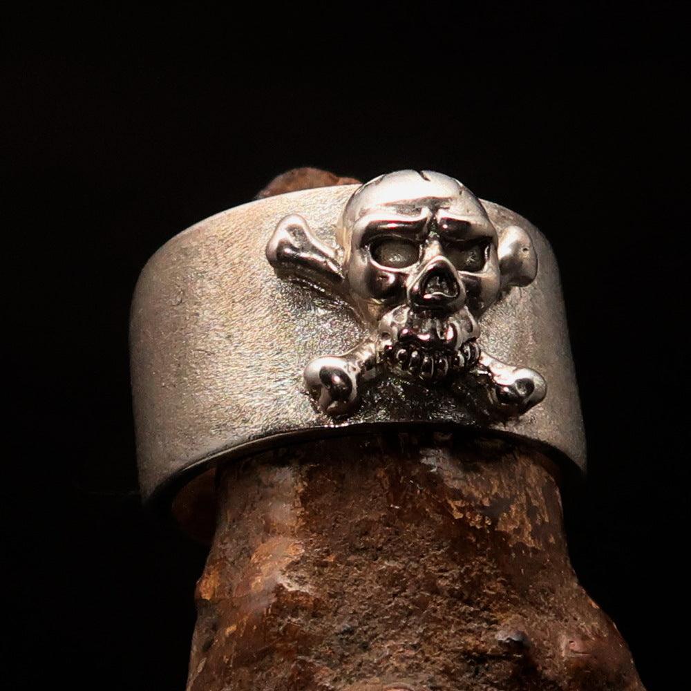 Men's Pirate Band Ring featuring a Jolly Roger Skull design in two-tone sterling silver with high polished and matte finishes.