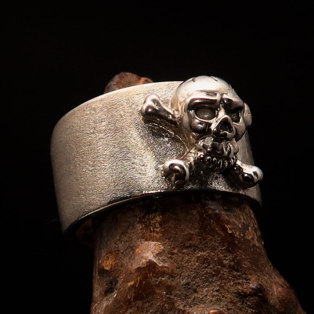 Men's Pirate Band Ring featuring a Jolly Roger Skull design in two-tone sterling silver with high polished and matte finishes.