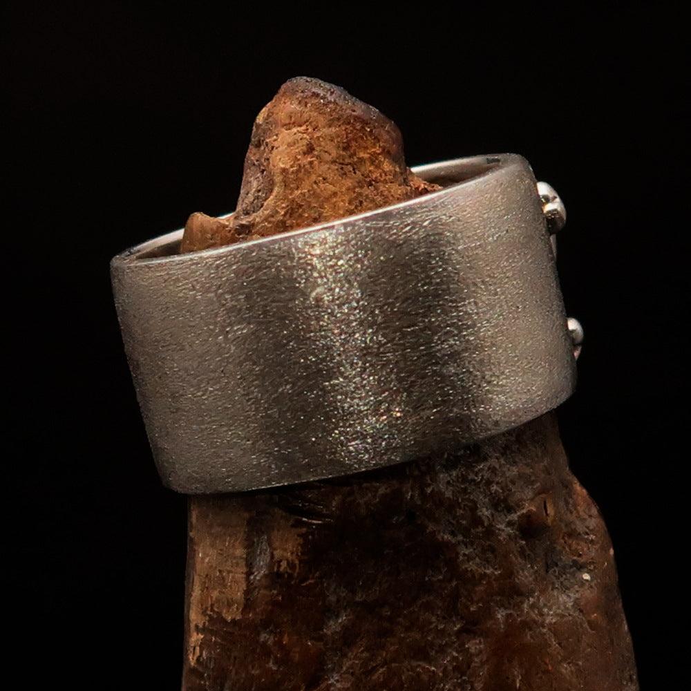 Men's Pirate Band Ring featuring a Jolly Roger Skull design in two-tone sterling silver with high polished and matte finishes.