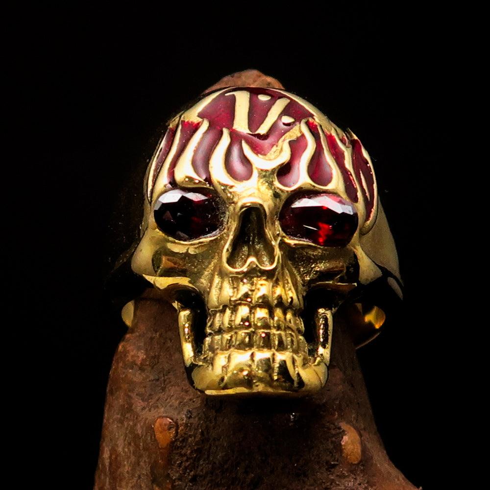 Men's 1% Flaming Skull Outlaw Ring featuring red enamel and red cubic zirconia eyes, crafted from solid brass with a polished finish.