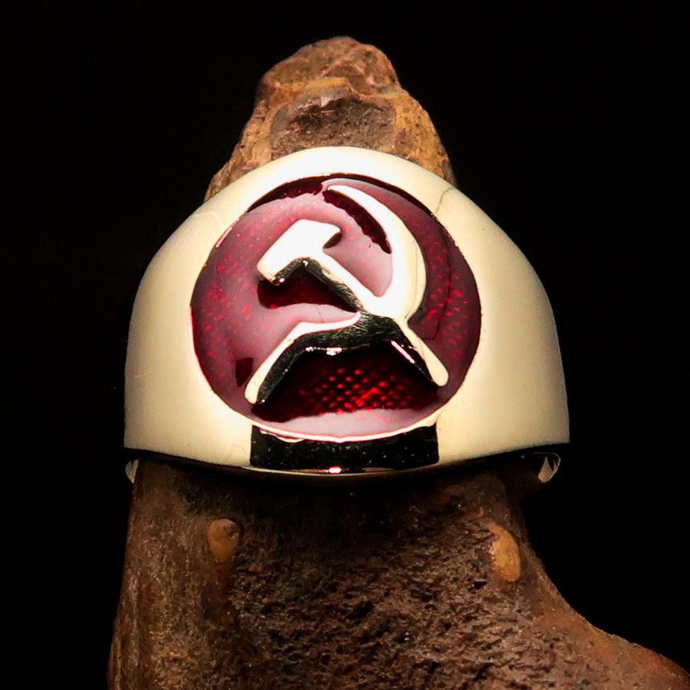 Men's red Hammer and Sickle Crest Ring made of solid brass with a polished finish and vibrant red enamel inlay, showcasing its unique design.