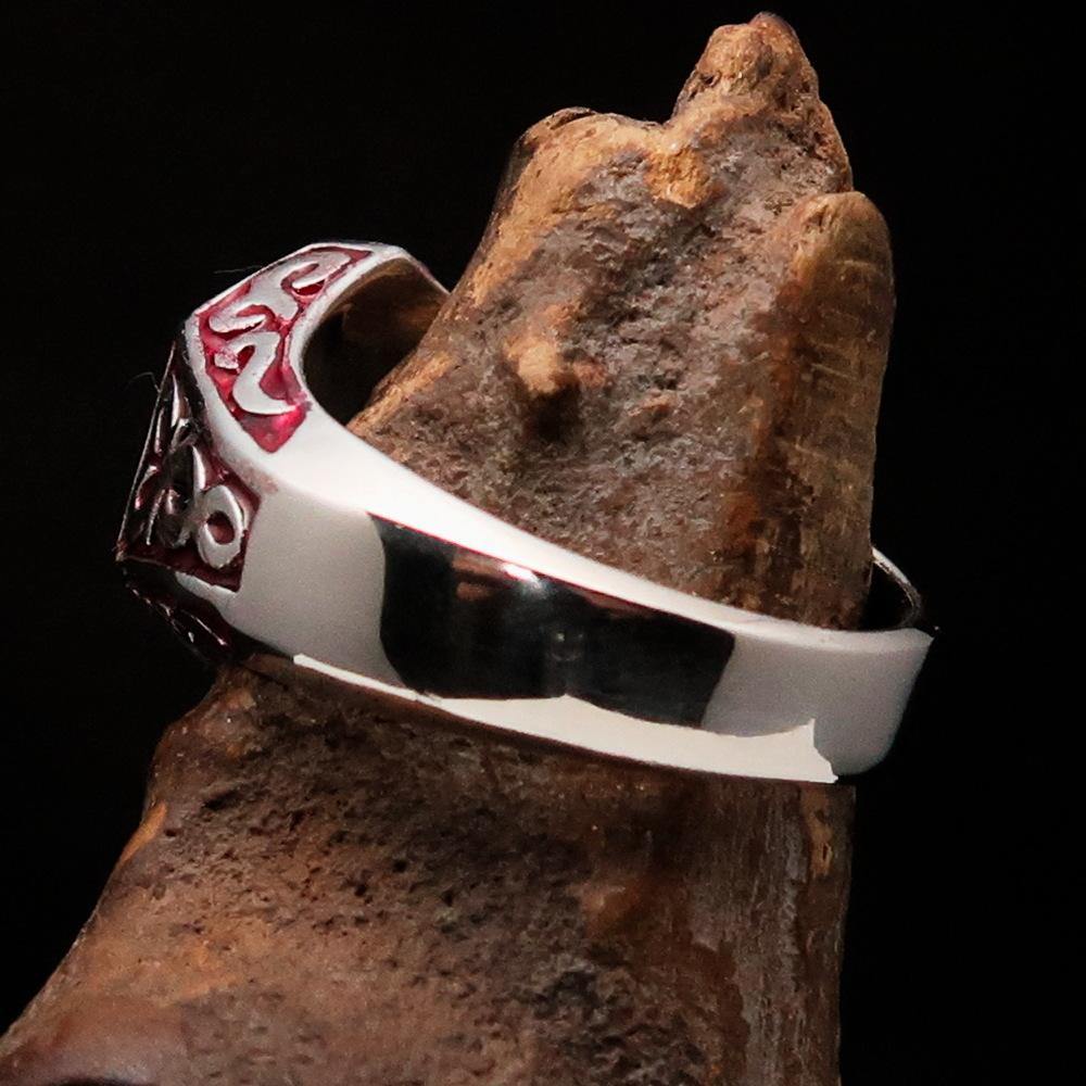 Men's Red Outlaw Biker Ring 1% made of solid sterling silver with high-polished finish and red enamel, showcasing its unique design and craftsmanship.