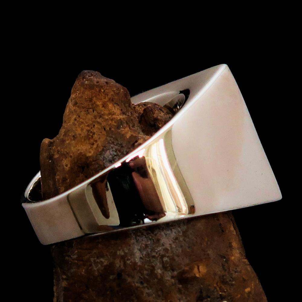 Men's sterling silver ring featuring the green Eye of Ra design, polished finish, and hallmarked 925.