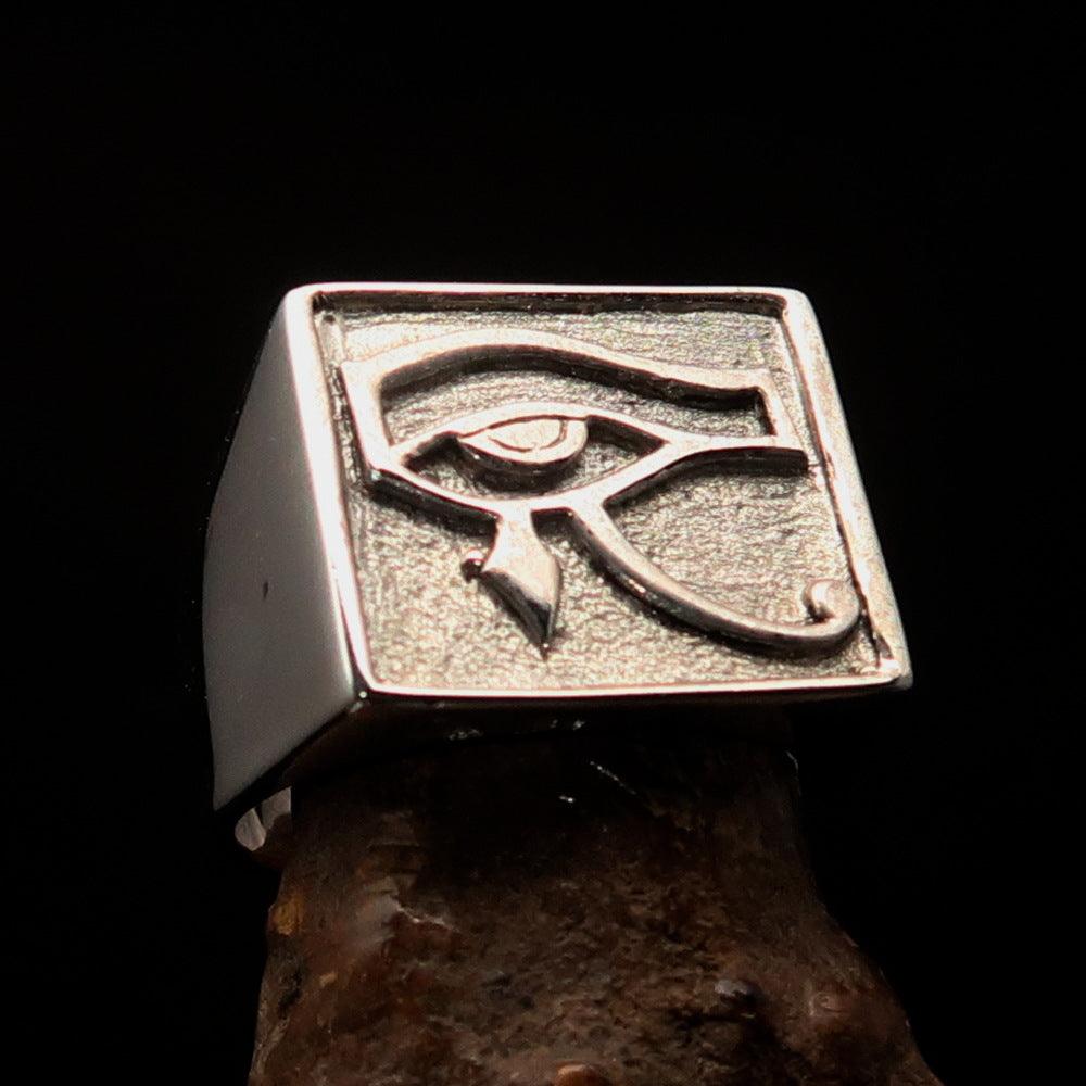 Men's sterling silver ring featuring the All Seeing Udjat Eye of Ra in a two-tone finish, showcasing intricate design and craftsmanship.