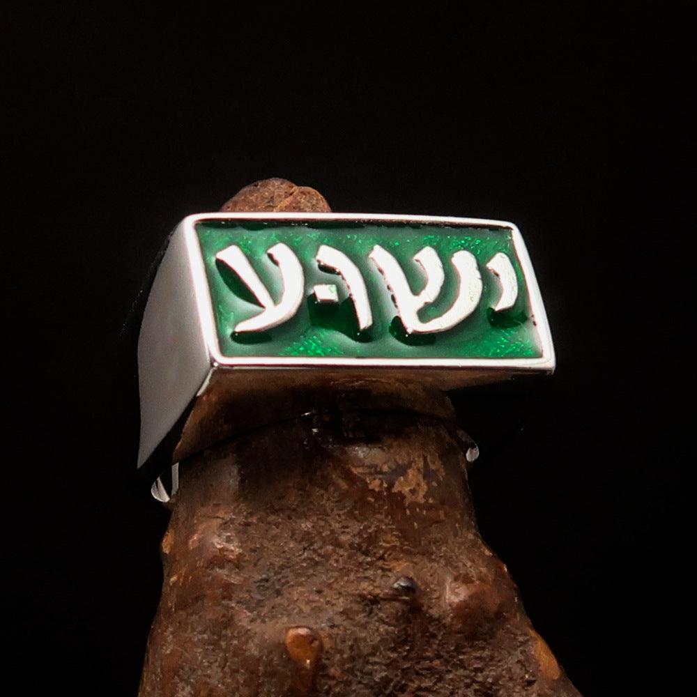 Men's sterling silver ring featuring Jesus in Hebrew design with green enamel accents, showcasing high polish and RCRN logo.