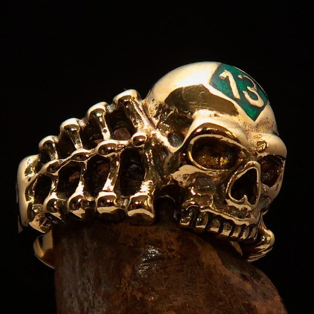 Men's Skull and Bones Ring in green enamel, crafted from solid brass, size 13, featuring a unique skull design.