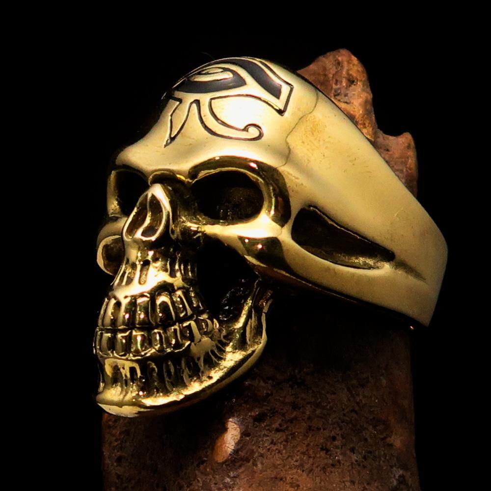Men's Skull Ring made of solid brass featuring the Eye of Ra design with a high polished finish and black enamel accents.