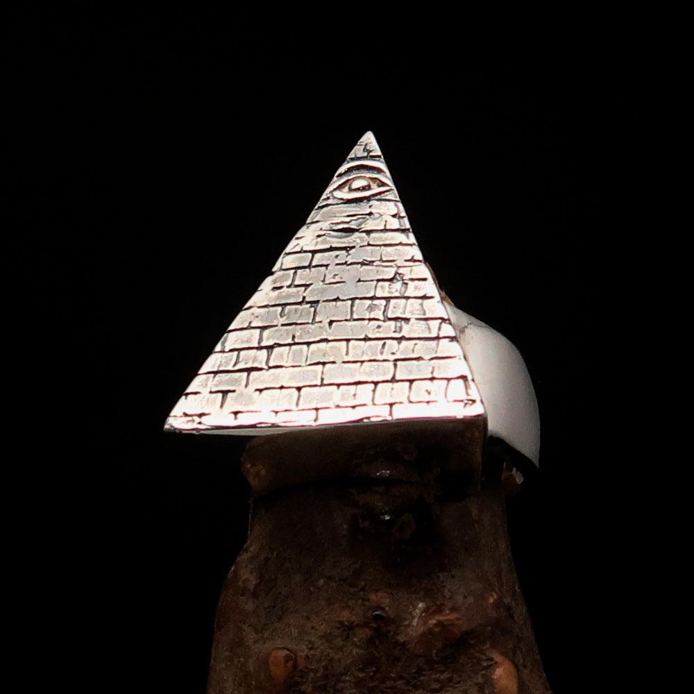 Men's sterling silver ring featuring an All Seeing Eye design on a pyramid, showcasing intricate details and a polished finish.