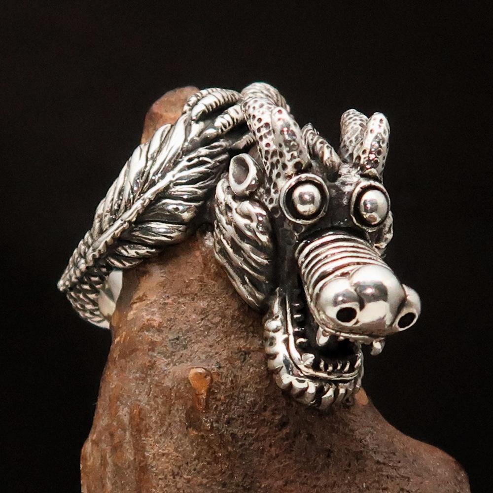 Men's Sterling Silver Dragon Ring featuring intricate dragon design, solid construction, and polished finish.
