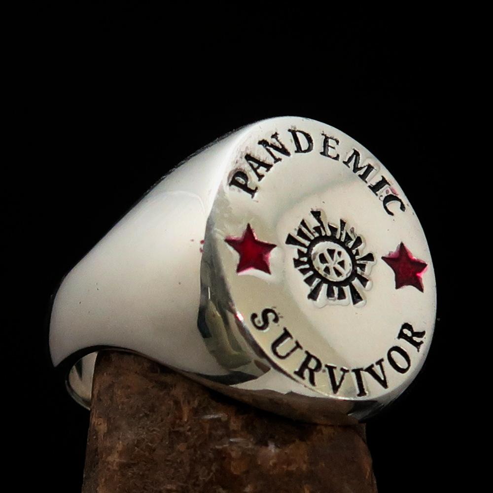 Men's sterling silver ring with red and black enamel, hallmarked 925, featuring RCRN logo.