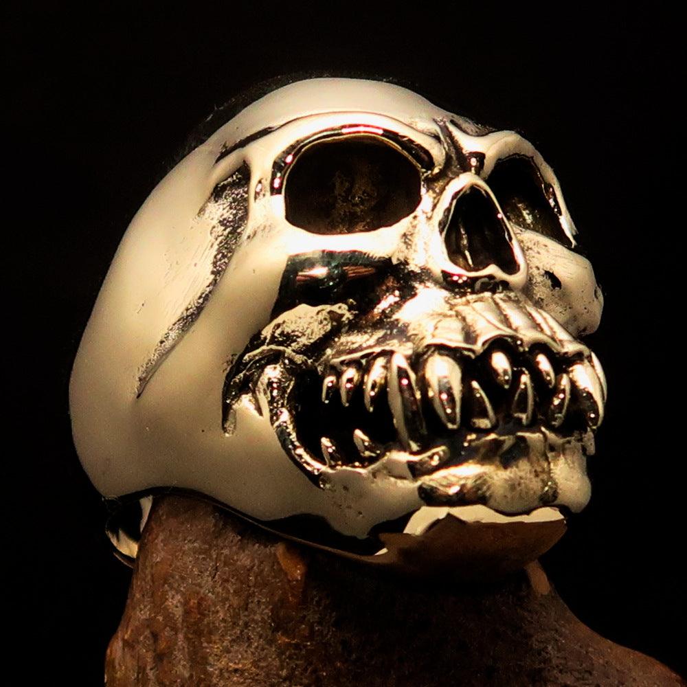 Men's Zombie Fang Skull Ring made of antiqued brass, featuring intricate skull and fang details, perfect for unique fashion.