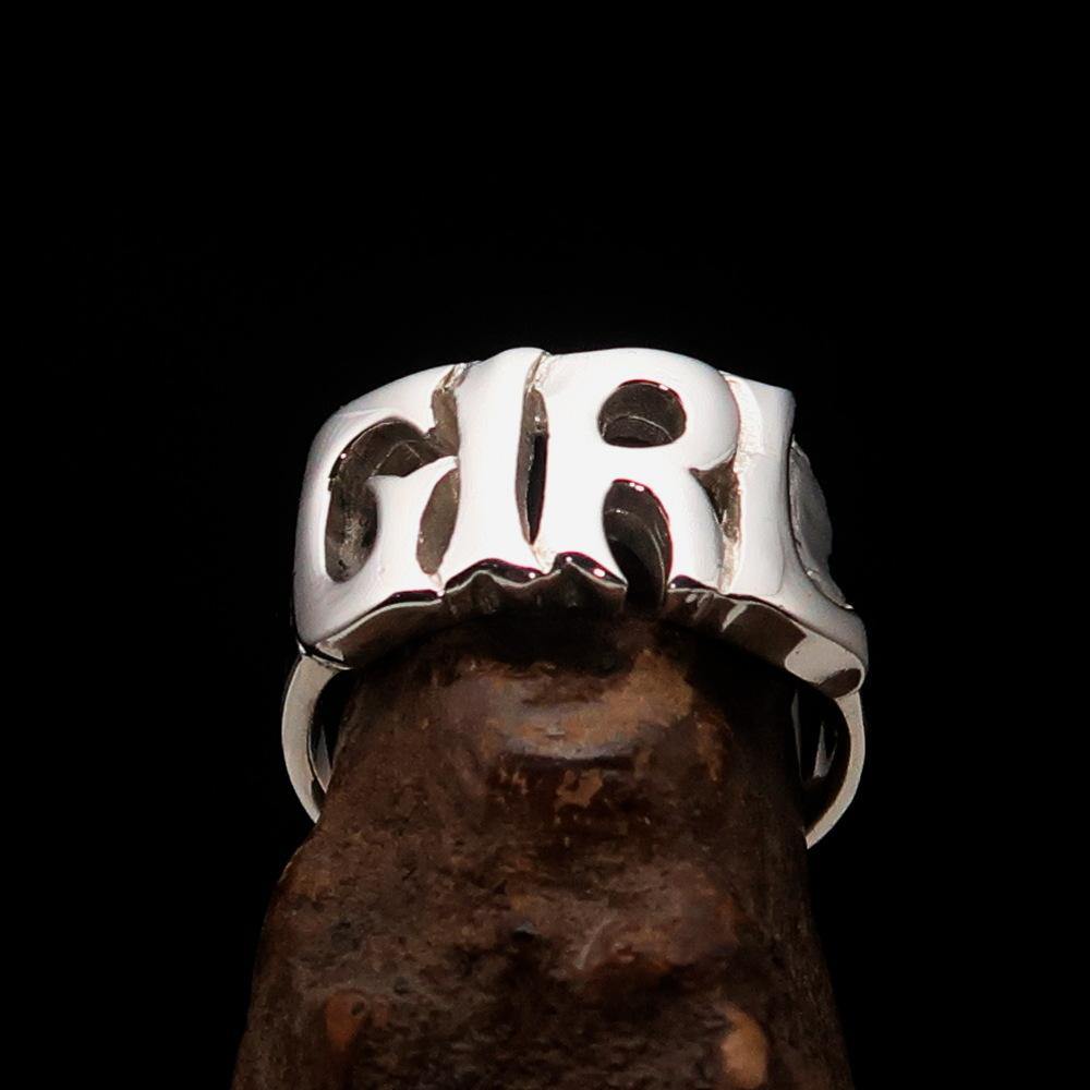 A beautifully crafted One Word Girl Ring made of high-polished sterling silver, showcasing its elegant design and hallmark 925.