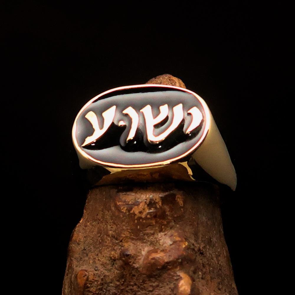 A beautifully crafted oval Men's Ring made of solid brass, featuring a black enamel finish and Hebrew inscription of Jesus, with the RCRN logo engraved.