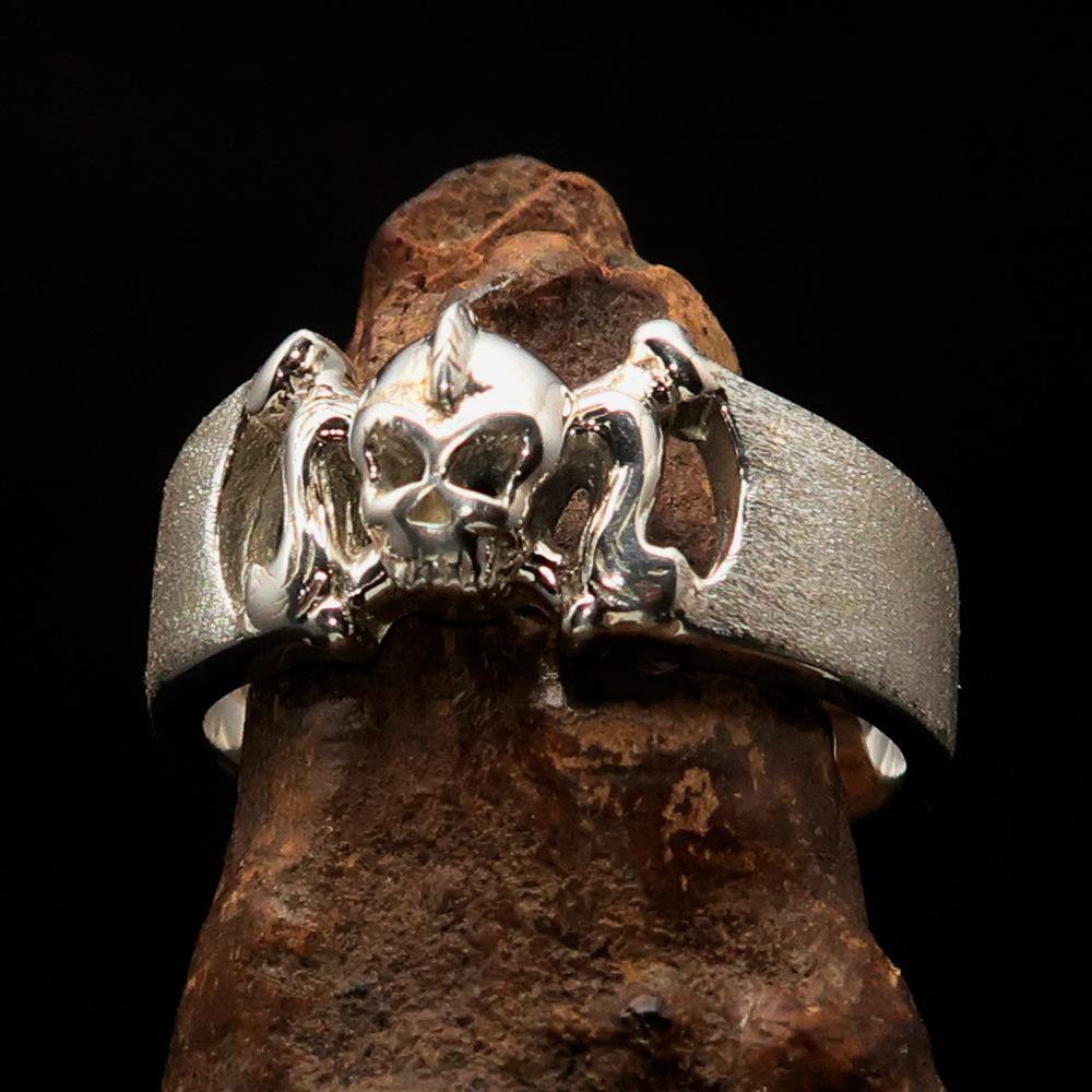 Matte sterling silver Pony Tail Girly Skull Ring showcasing a unique skull design with a ponytail, perfect for edgy fashion lovers.