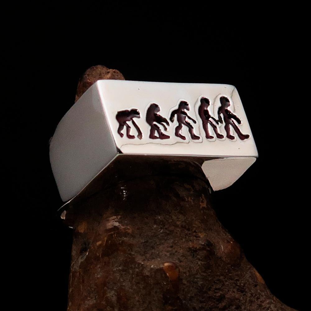 A beautifully crafted rectangle shaped black Human Evolution Ring made of solid sterling silver with a high polish finish and black enamel.