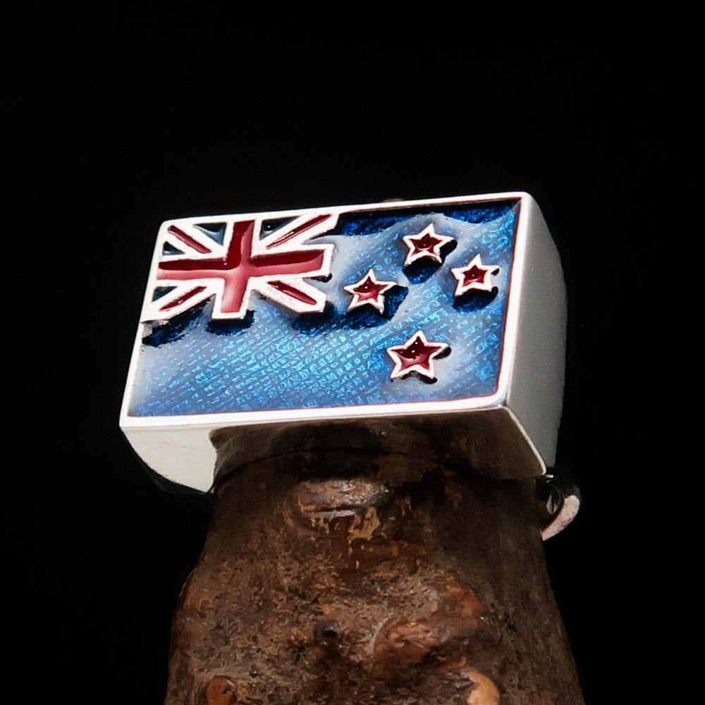 Men's New Zealand Flag Ring made of solid sterling silver with high polish and enamel finish, showcasing the vibrant flag design.