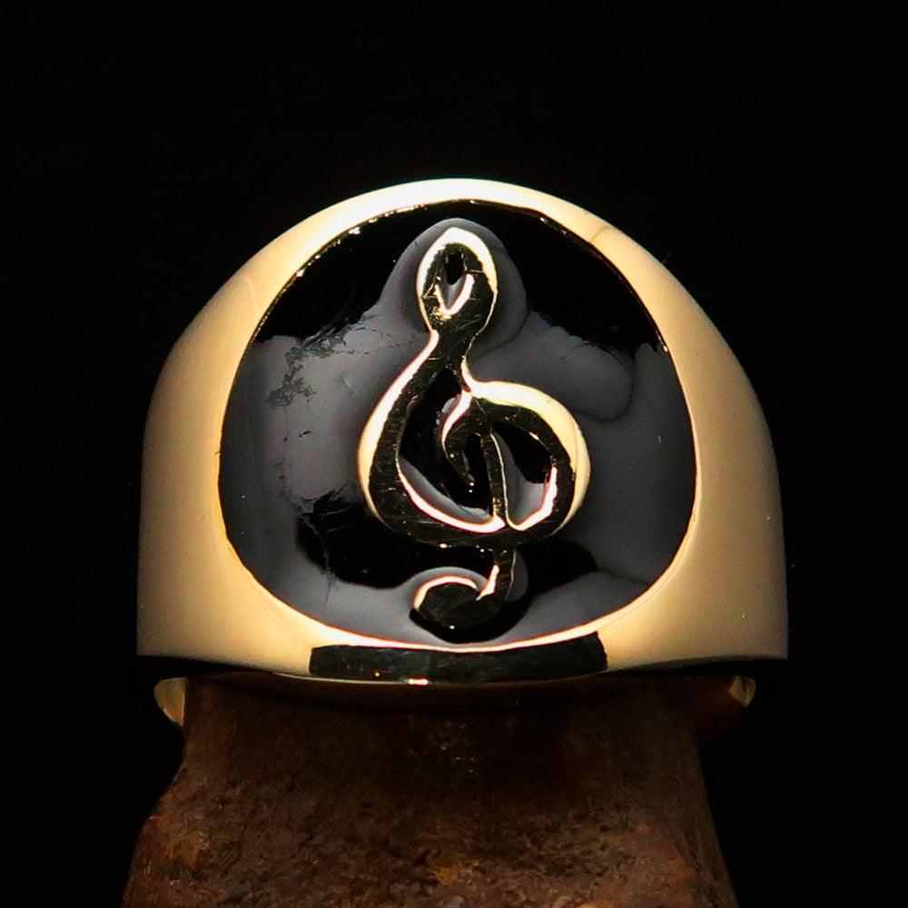 Men's black Treble Clef pinky ring made of solid brass with high-polished black enamel finish, showcasing a musical design.