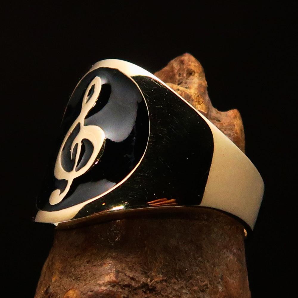 Men's black Treble Clef pinky ring made of solid brass with high-polished black enamel finish, showcasing a musical design.
