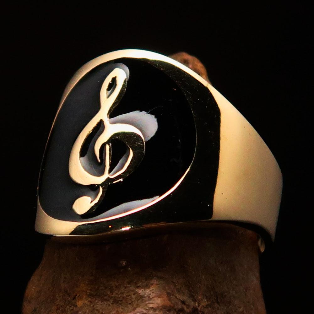 Men's black Treble Clef pinky ring made of solid brass with high-polished black enamel finish, showcasing a musical design.
