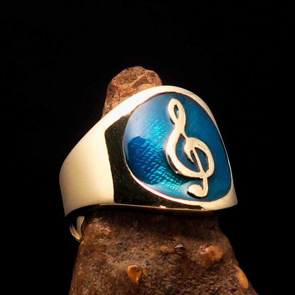 Men's blue Treble Clef Pinky Ring made of solid brass with high polish and blue enamel detailing.