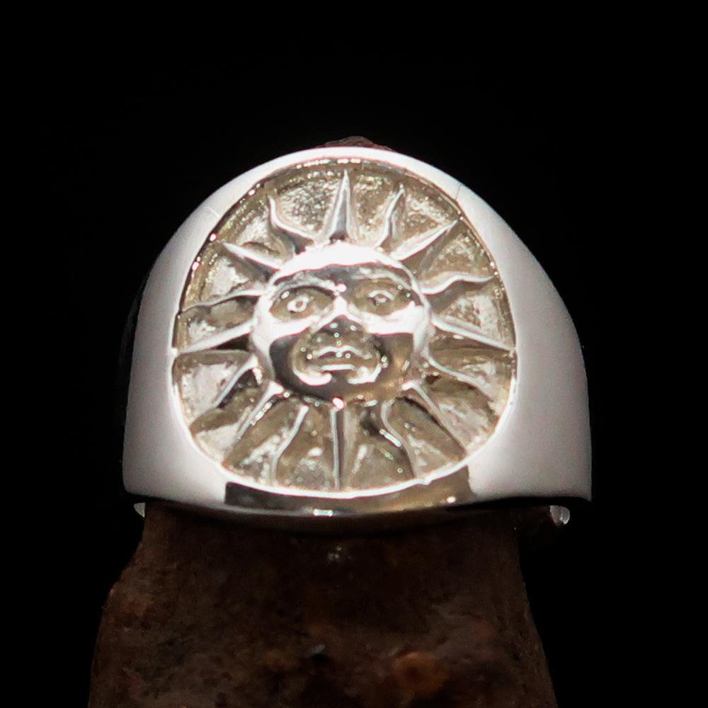 A shiny sterling silver Men's Inca Sun Aztec Ring featuring intricate designs, hallmarked 925, showcasing its high polish finish.
