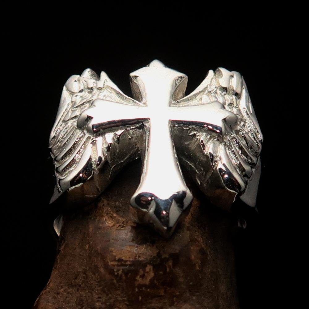 Men's flying winged cross ring made of high polished sterling silver, showcasing intricate design and hallmarked 925.