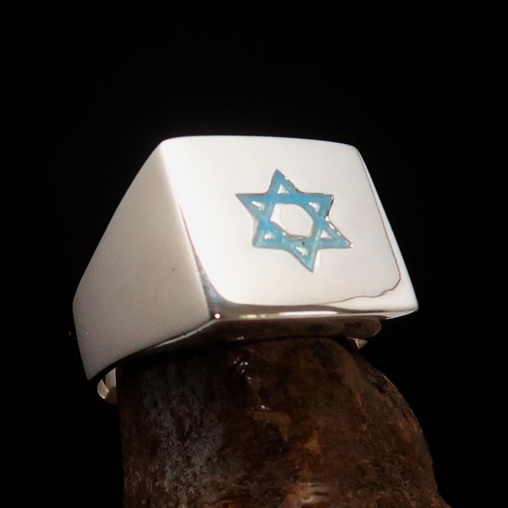 A beautifully crafted Sterling Silver Men's Hexagram Ring featuring a blue enamel Star of David design, hallmarked 925.
