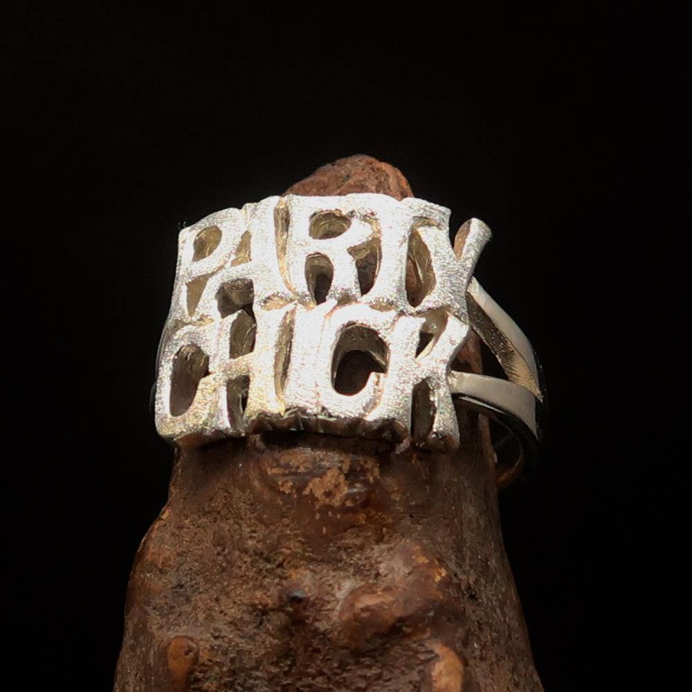 A beautifully crafted Two-Tone Matte Sterling Silver Party Chick Ring showcasing its unique design and polished finish.