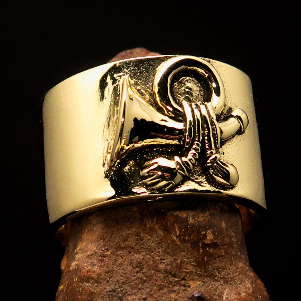 Solid Brass Yankee Cavalry Horn Ring with high polish finish, showcasing its elegant design and craftsmanship.
