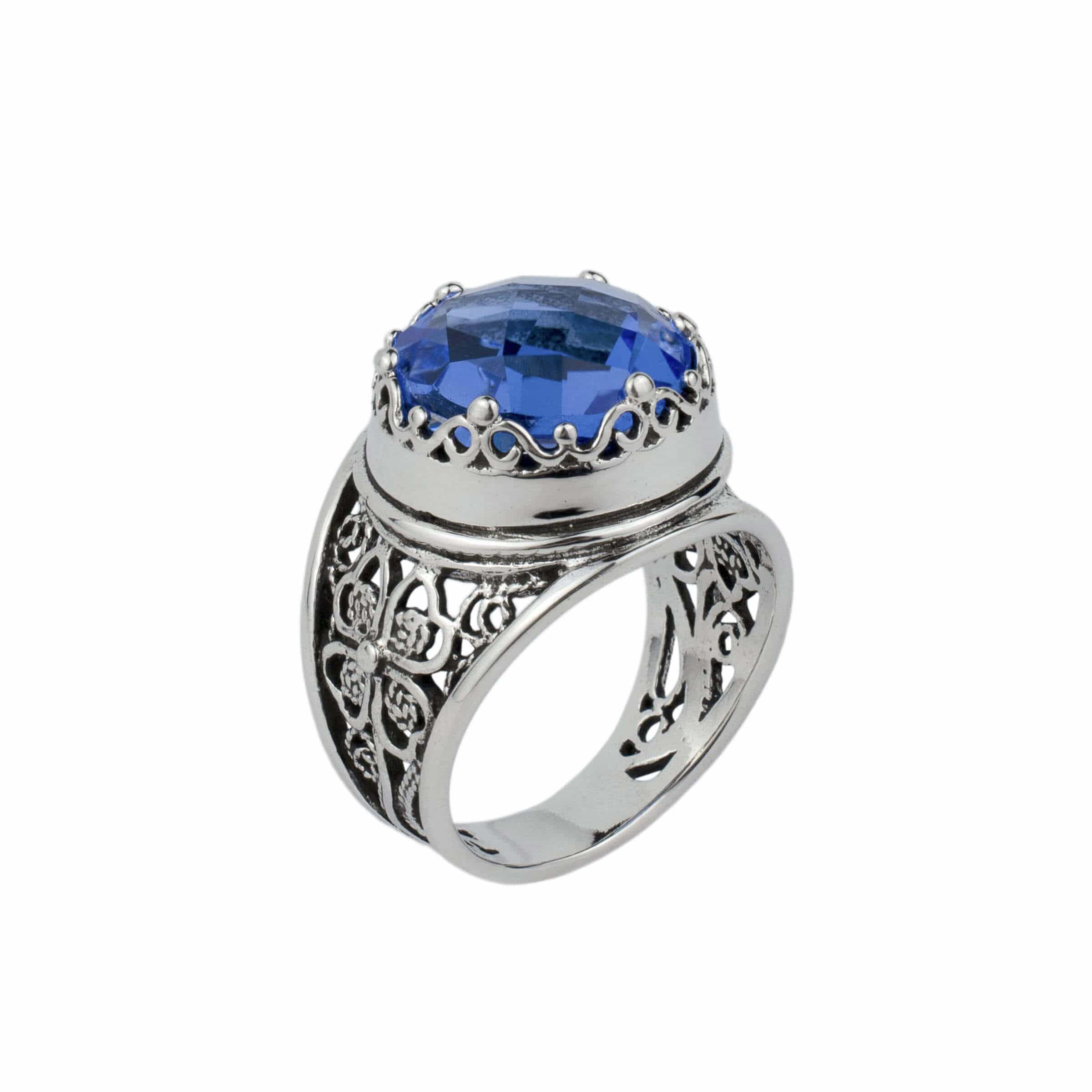 A stunning sterling silver filigree ring featuring a 12 mm faceted blue quartz gemstone, elegantly designed for women.