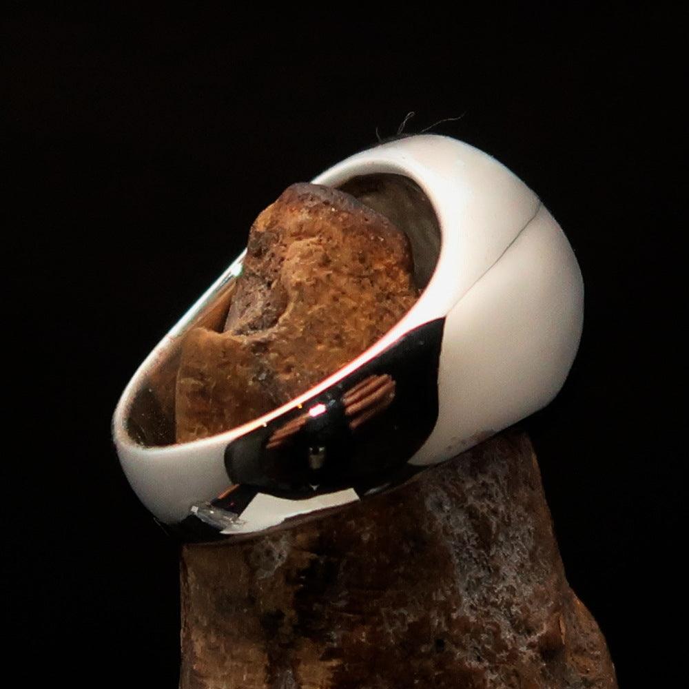 Men's sterling silver ring featuring a cannabis leaf symbol with red enamel, hallmarked 925, showcasing intricate design.