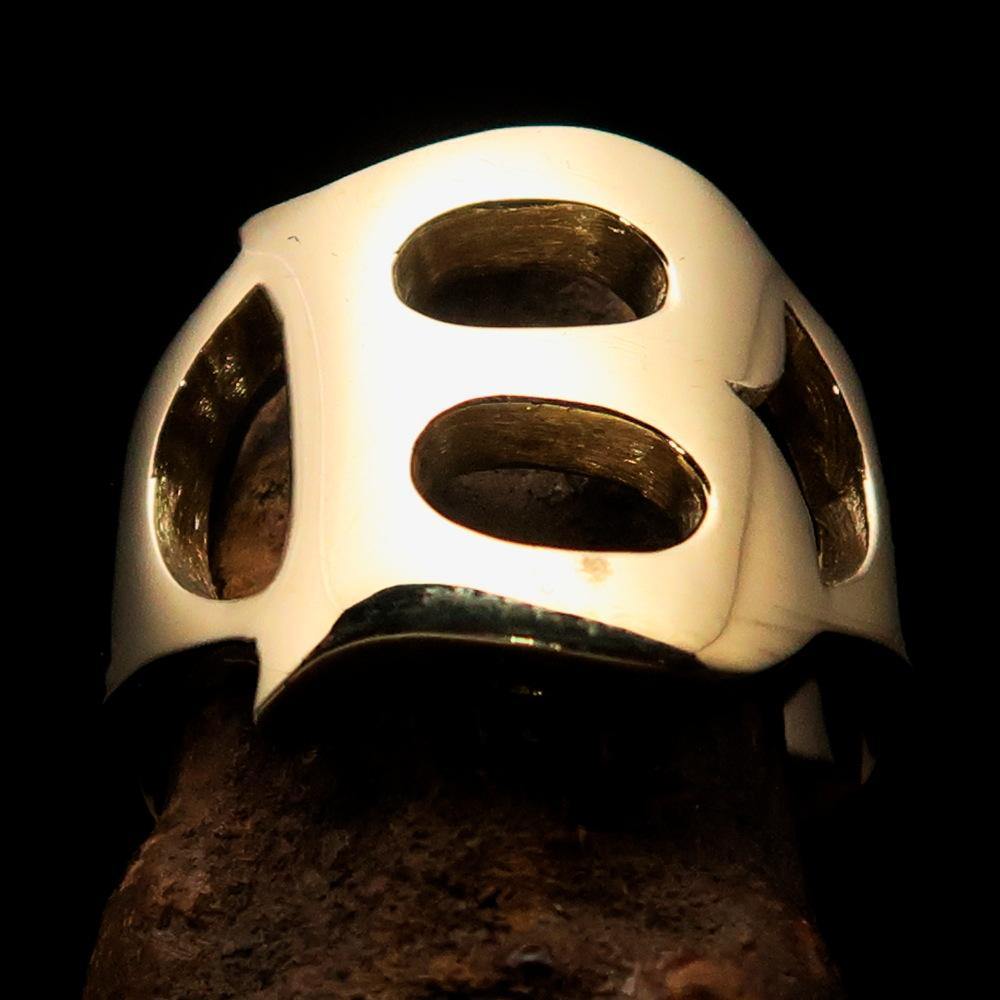 Mirror polished men's brass initial ring featuring a bold letter B, showcasing its shiny finish and elegant design.