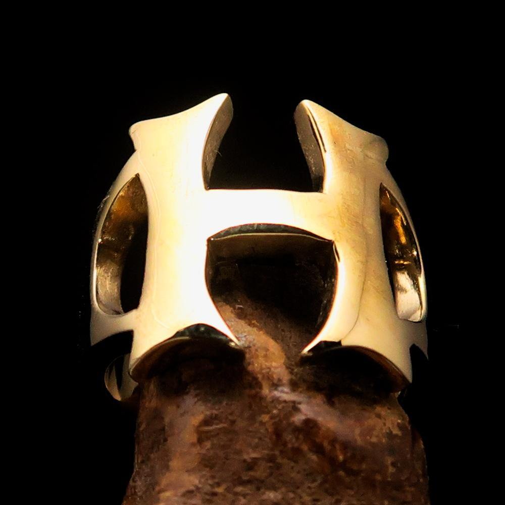 Mirror polished men's brass initial ring featuring a bold letter H, showcasing a high-shine finish and elegant design.