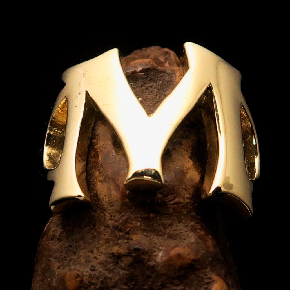 Mirror polished men's brass initial ring featuring a bold letter M, showcasing a high shine finish and elegant design.