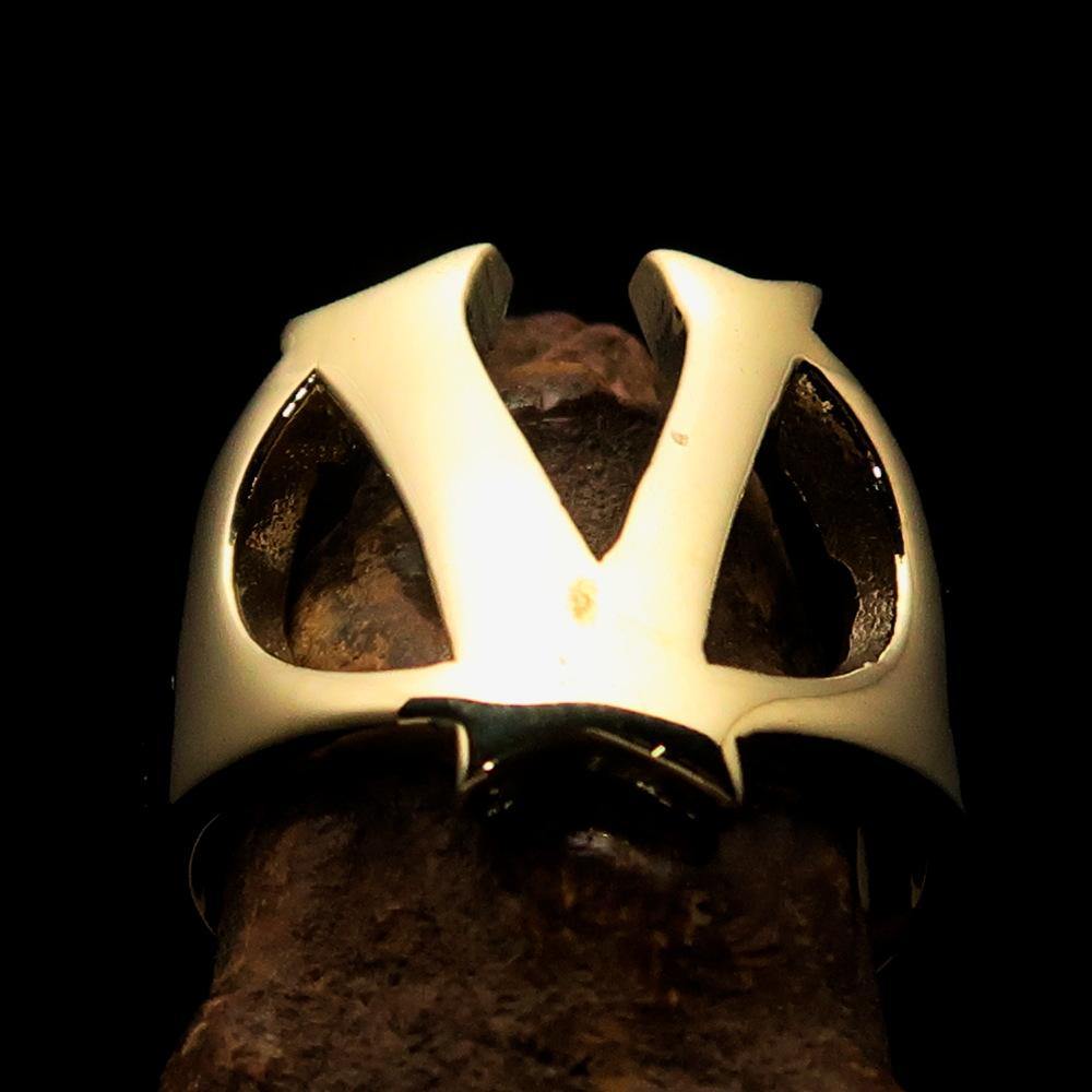 Mirror polished men's brass initial ring featuring a bold letter V, showcasing its shiny finish and elegant design.