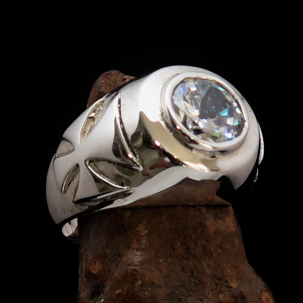 Men's Solitaire Iron Cross Ring made of solid sterling silver with a white Cubic Zirconia stone, showcasing a high polished finish.