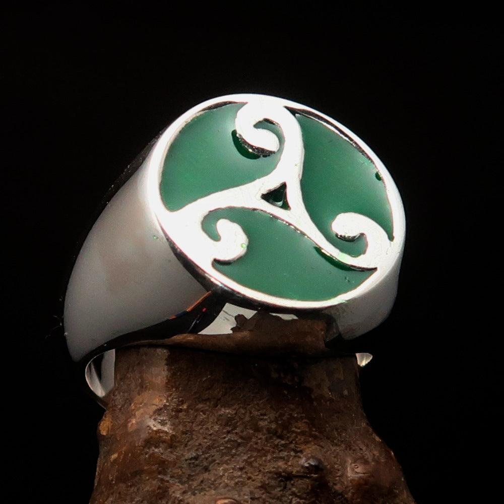 Men's Celtic Triade Ring in sterling silver with green enamel Triskele design, showcasing intricate craftsmanship and high polish finish.