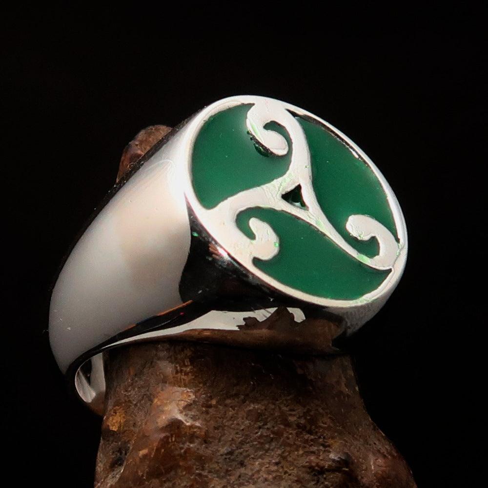 Men's Celtic Triade Ring in sterling silver with green enamel Triskele design, showcasing intricate craftsmanship and high polish finish.