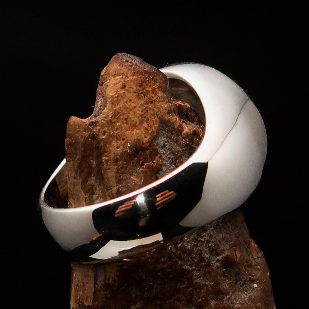 Men's Celtic Triade Ring in sterling silver with green enamel Triskele design, showcasing intricate craftsmanship and high polish finish.