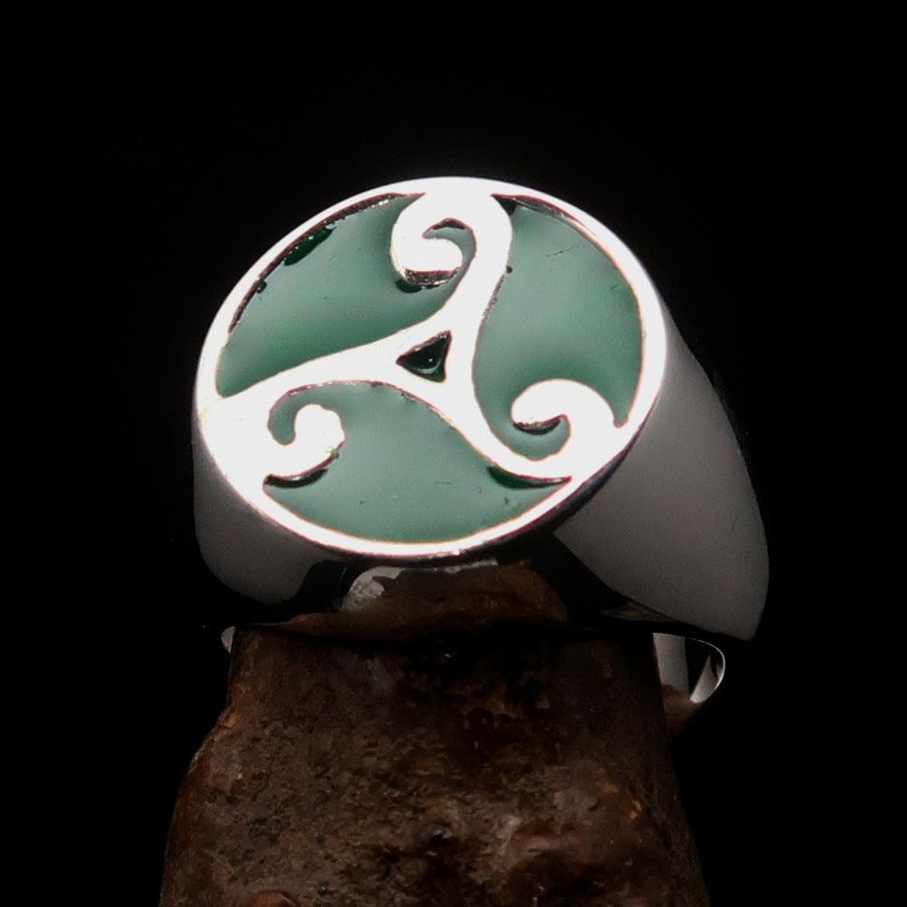 Men's Celtic Triade Ring in sterling silver with green enamel Triskele design, showcasing intricate craftsmanship and high polish finish.