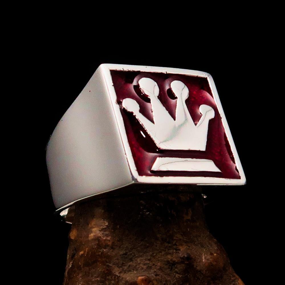 Sterling Silver Men's Chess Player Ring featuring a Queen's Crown design with red enamel accents, showcasing its polished finish.