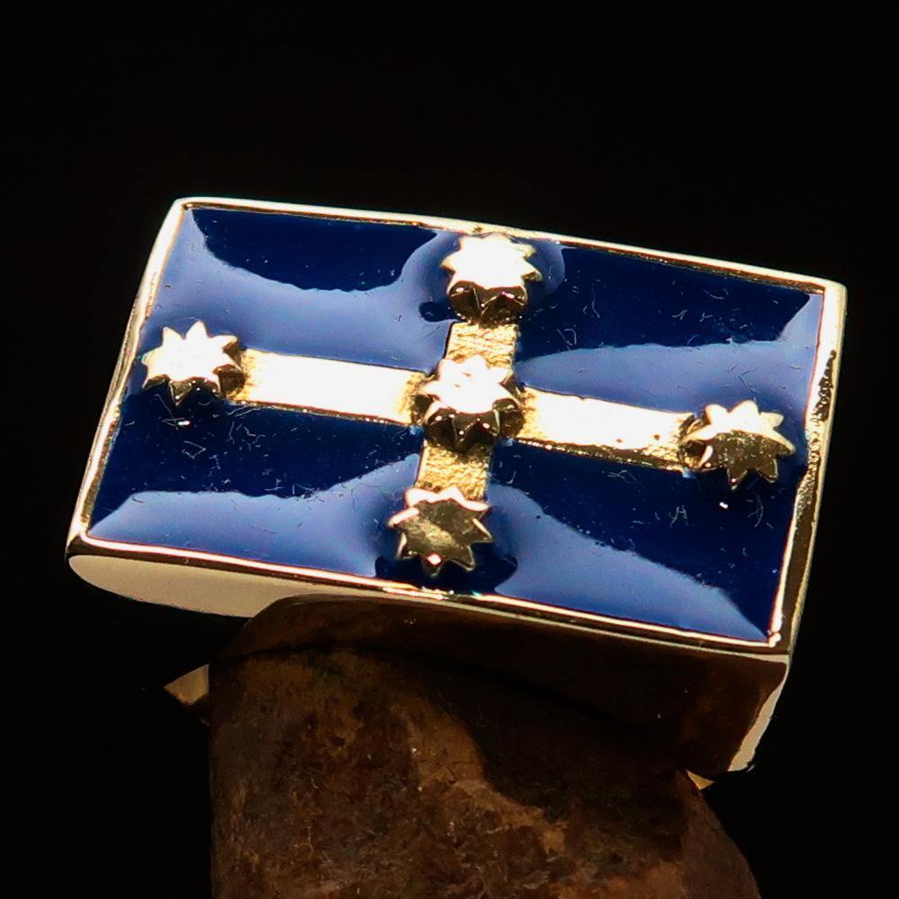 Men's Eureka Flag Ring made of solid brass with high polished finish and blue enamel, showcasing its unique design and craftsmanship.