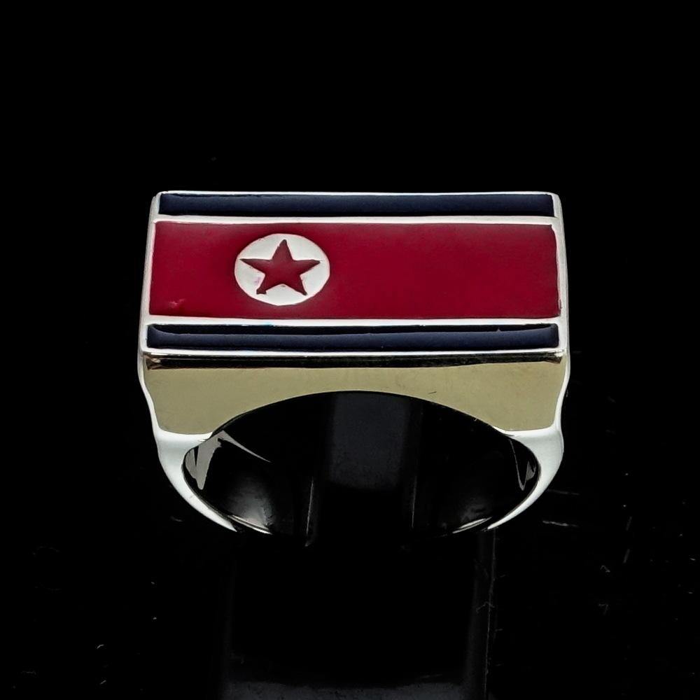 Men's Flag Ring featuring the North Korean flag, crafted from sterling silver with red and blue enamel accents.