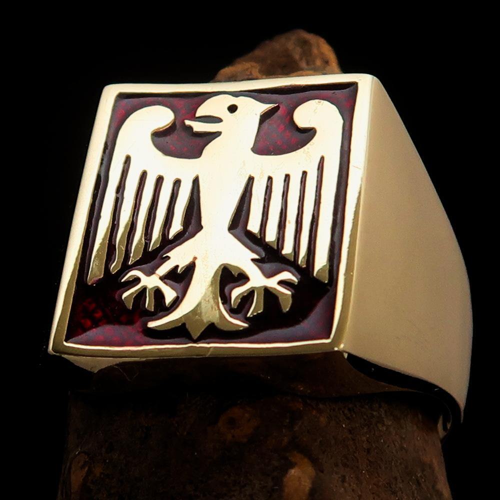 Men's German Eagle Seal Ring in red enamel, crafted from solid brass with a high polish finish, showcasing a bold and stylish design.