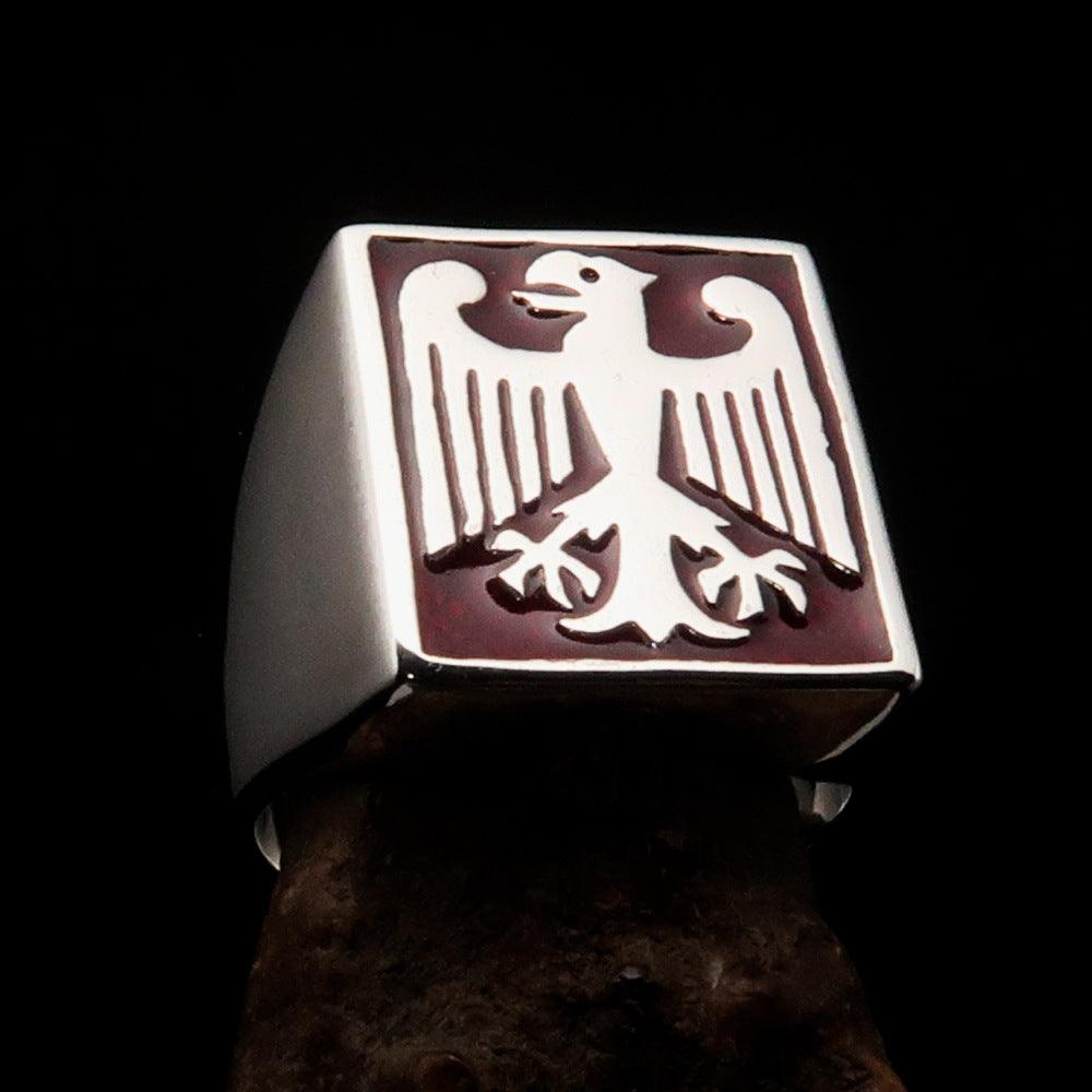 Men's German Eagle Seal Ring in sterling silver with red enamel, showcasing a polished finish and intricate design.