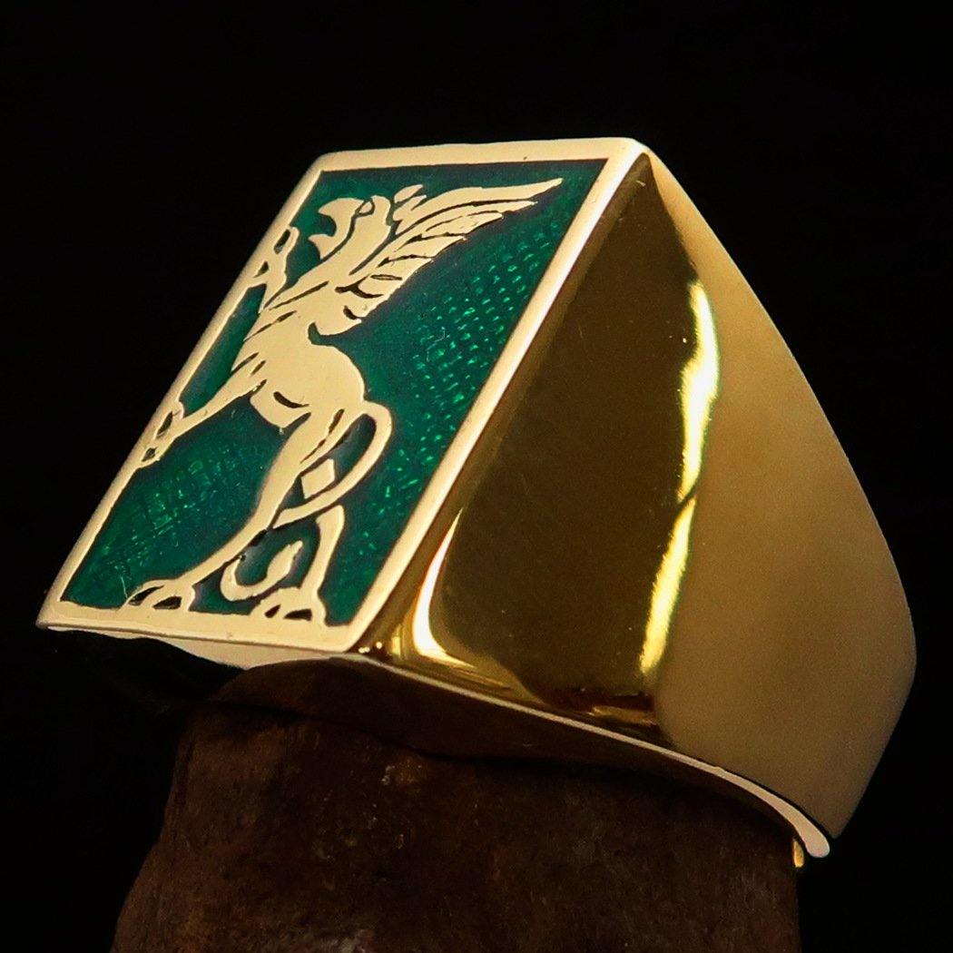 Men's Green Griffin Ring made of solid brass with high polish and green enamel finish, showcasing a griffin design.