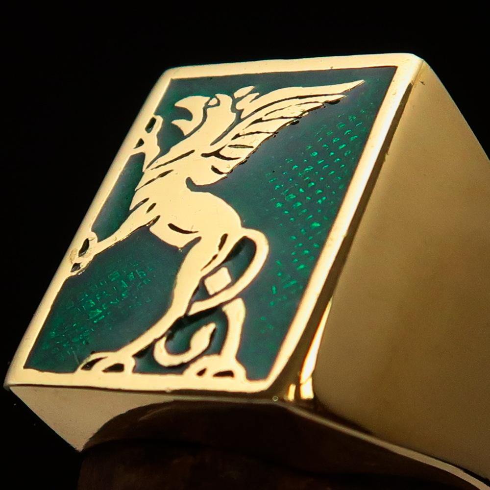 Men's Green Griffin Ring made of solid brass with high polish and green enamel finish, showcasing a griffin design.