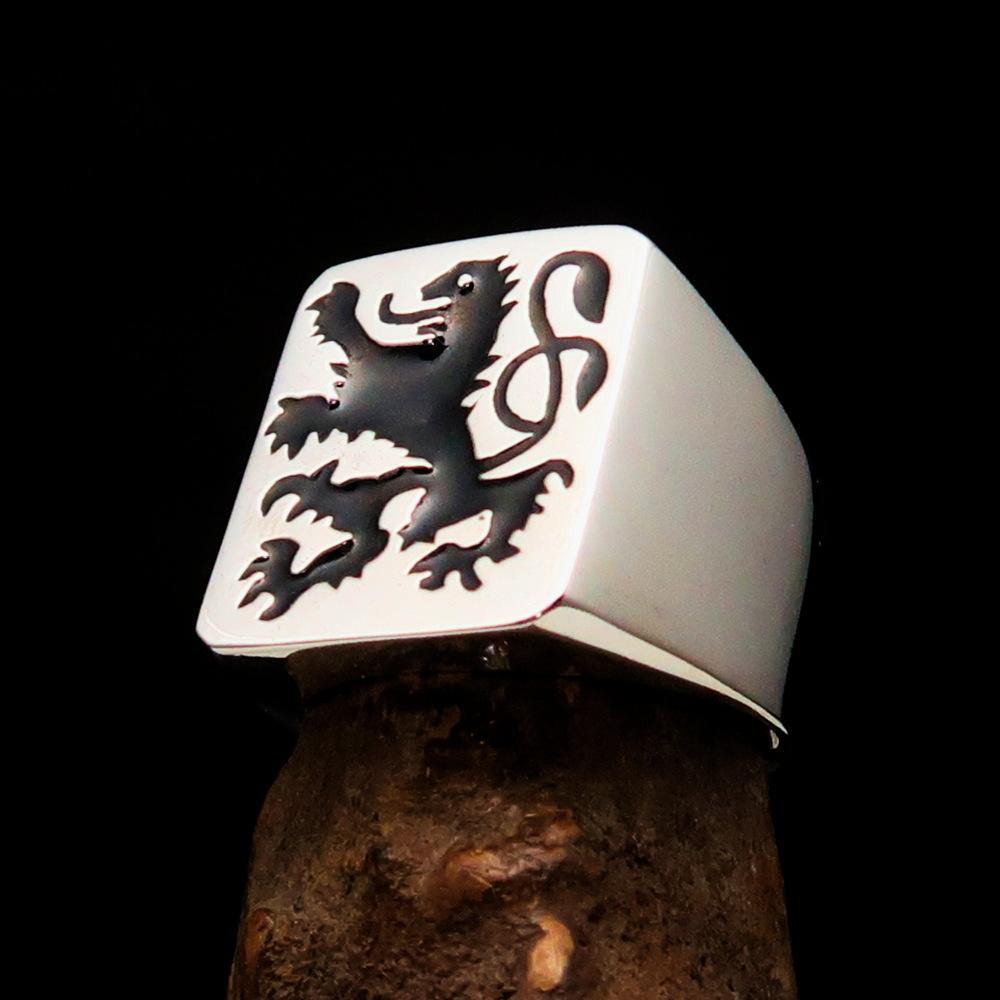 Men's Rampant Lion Ring in black sterling silver featuring a coat of arms design with high polish finish and black enamel.