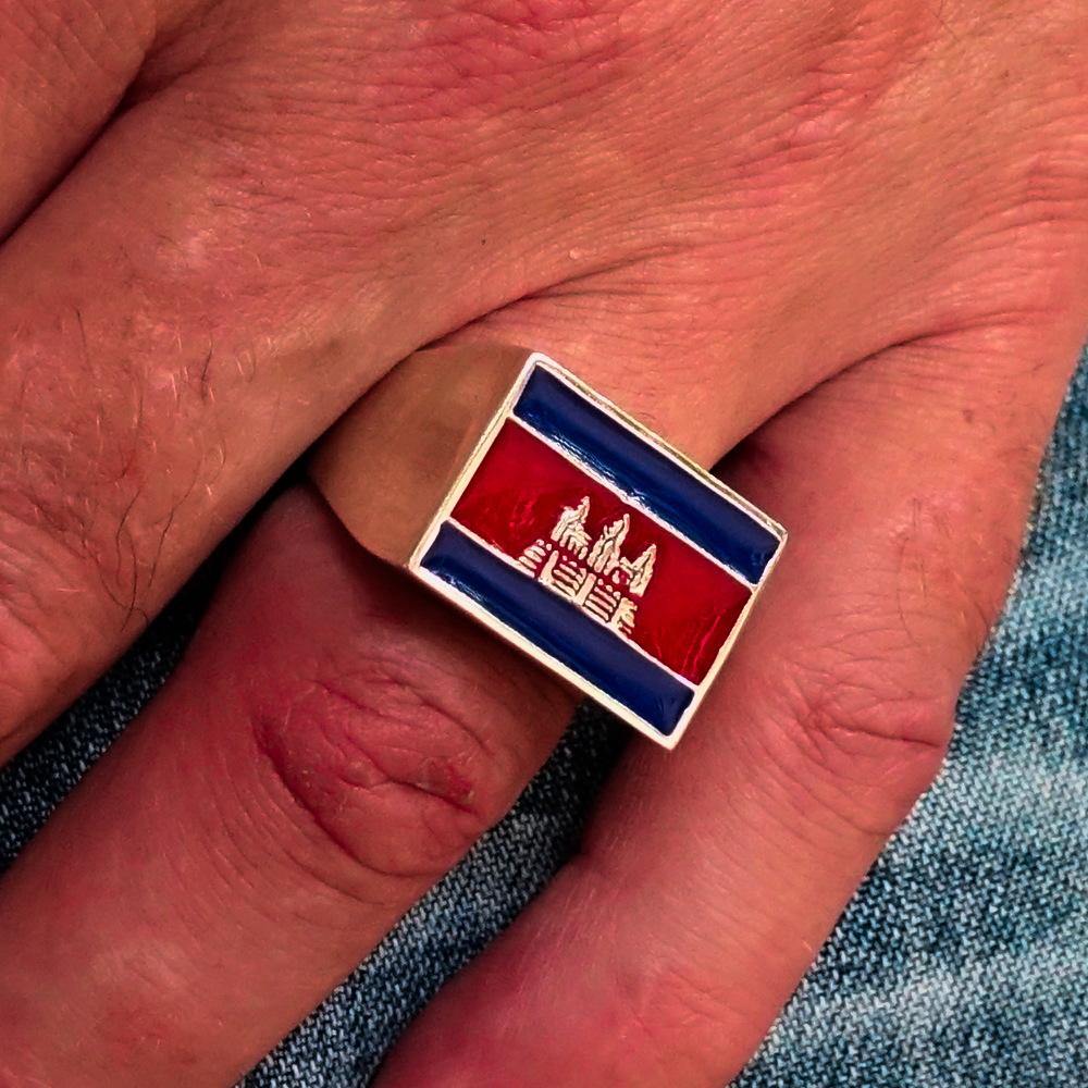 Men's rectangle flag ring crafted from sterling silver with blue and red enamel, showcasing Cambodian heritage.
