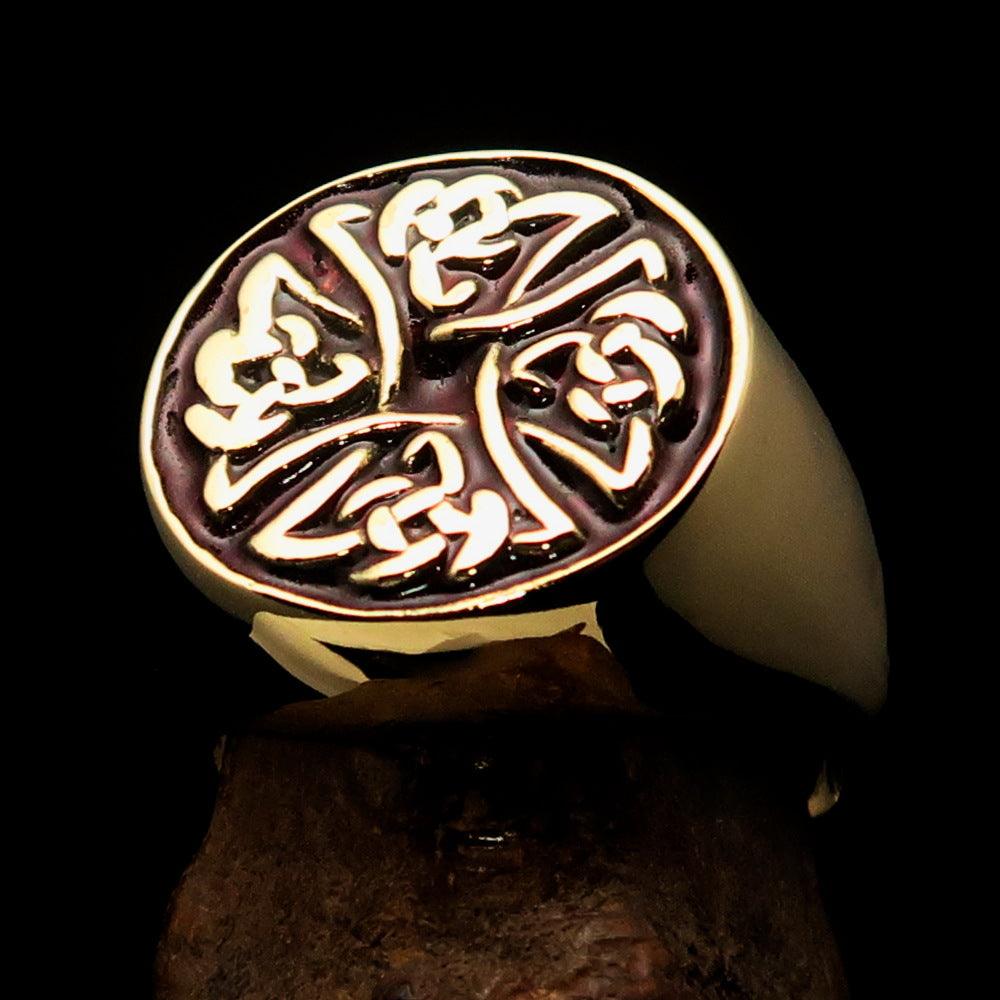 Men's ring featuring Celtic Birgit's Cross design in solid brass with a high polished finish and red enamel accents.